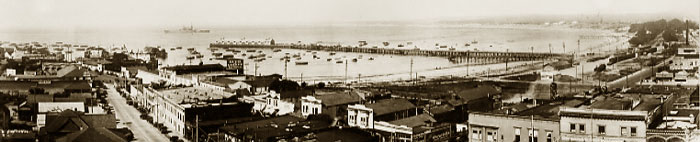 A.C. Heidrick photographer,with a navy ship in Monterey Bay from roof of San Carlos Hotel. Circa 1930   76-009-0001 ©2003 California Views